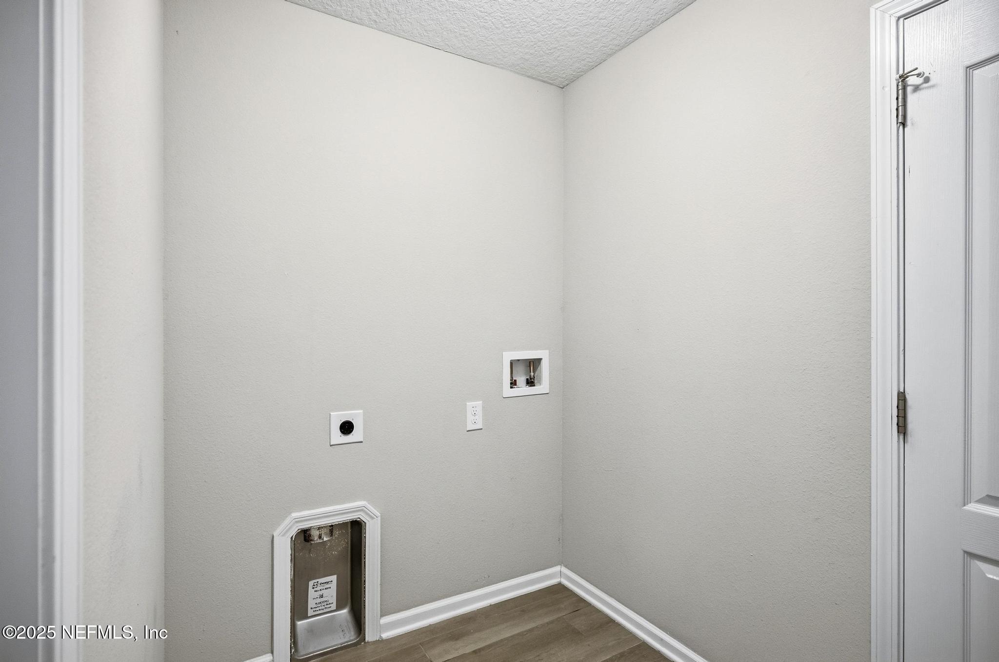 83 Hummingbird Court Palm Coast, FL 32164 - Photo 27 of 70 a view of a small space with wooden floor