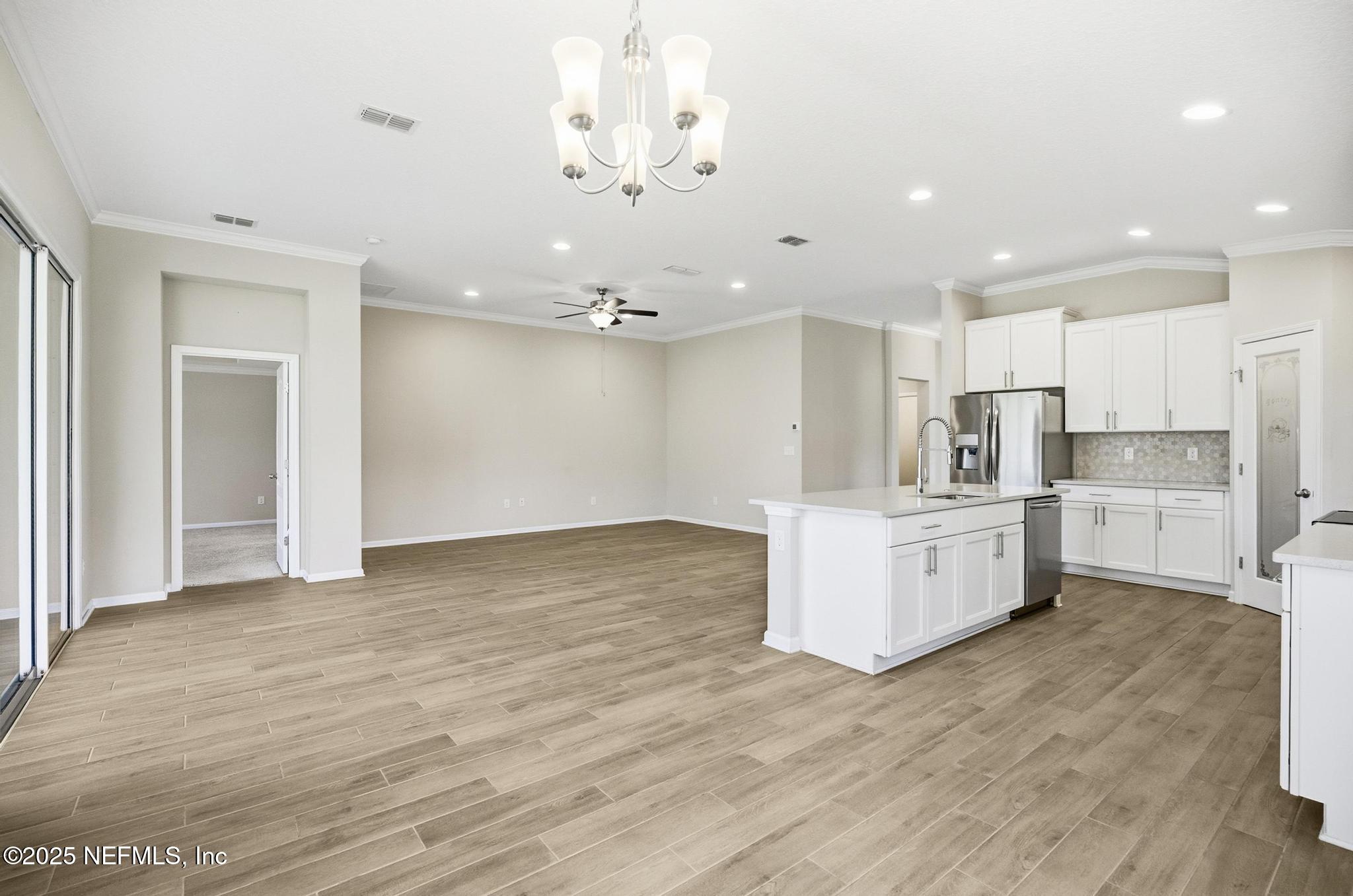83 Hummingbird Court Palm Coast, FL 32164 - Photo 45 of 70 a view of kitchen with wooden floor