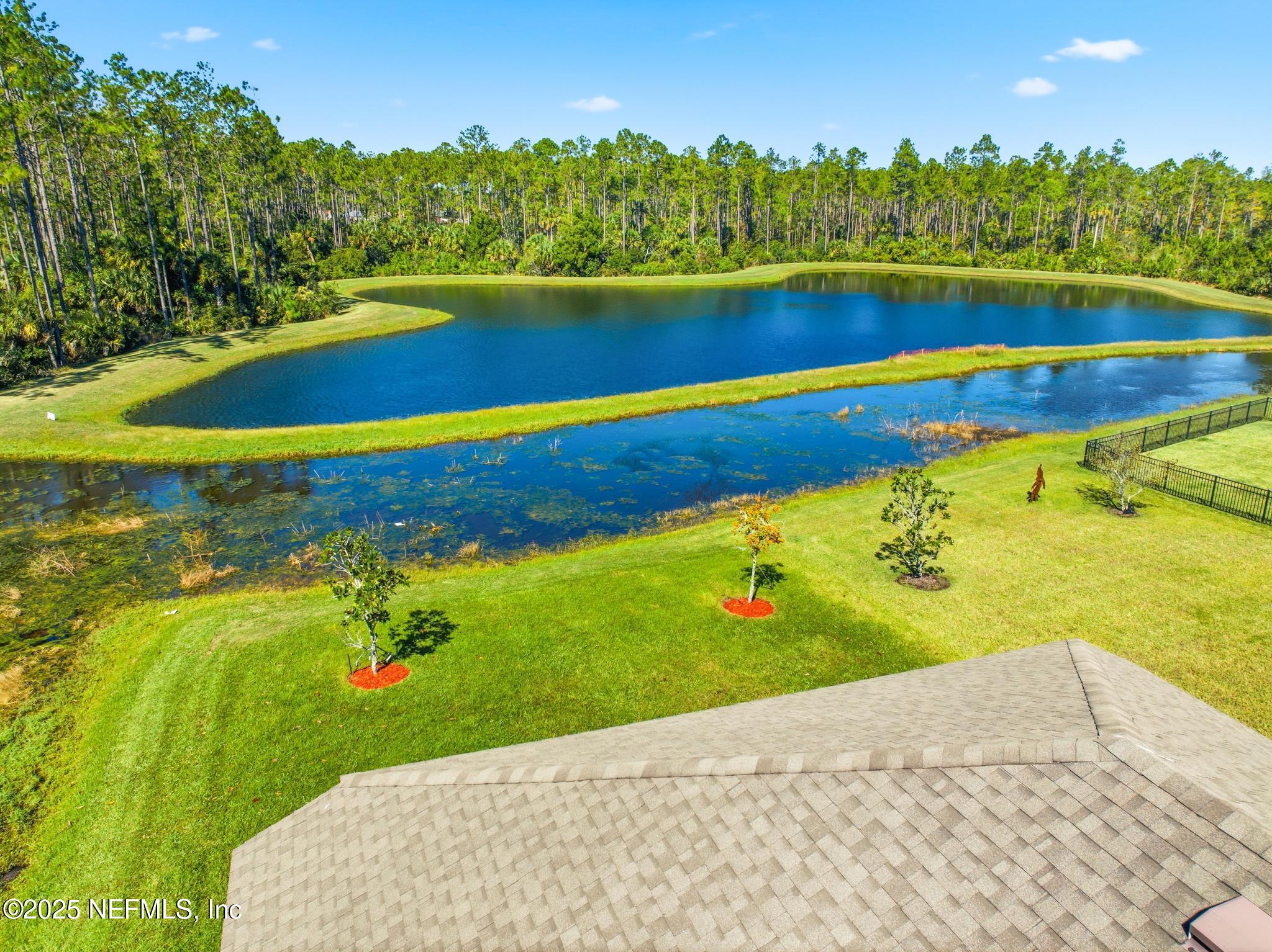 83 Hummingbird Court Palm Coast, FL 32164 - Photo 67 of 70 a view of an swimming pool and outdoor space