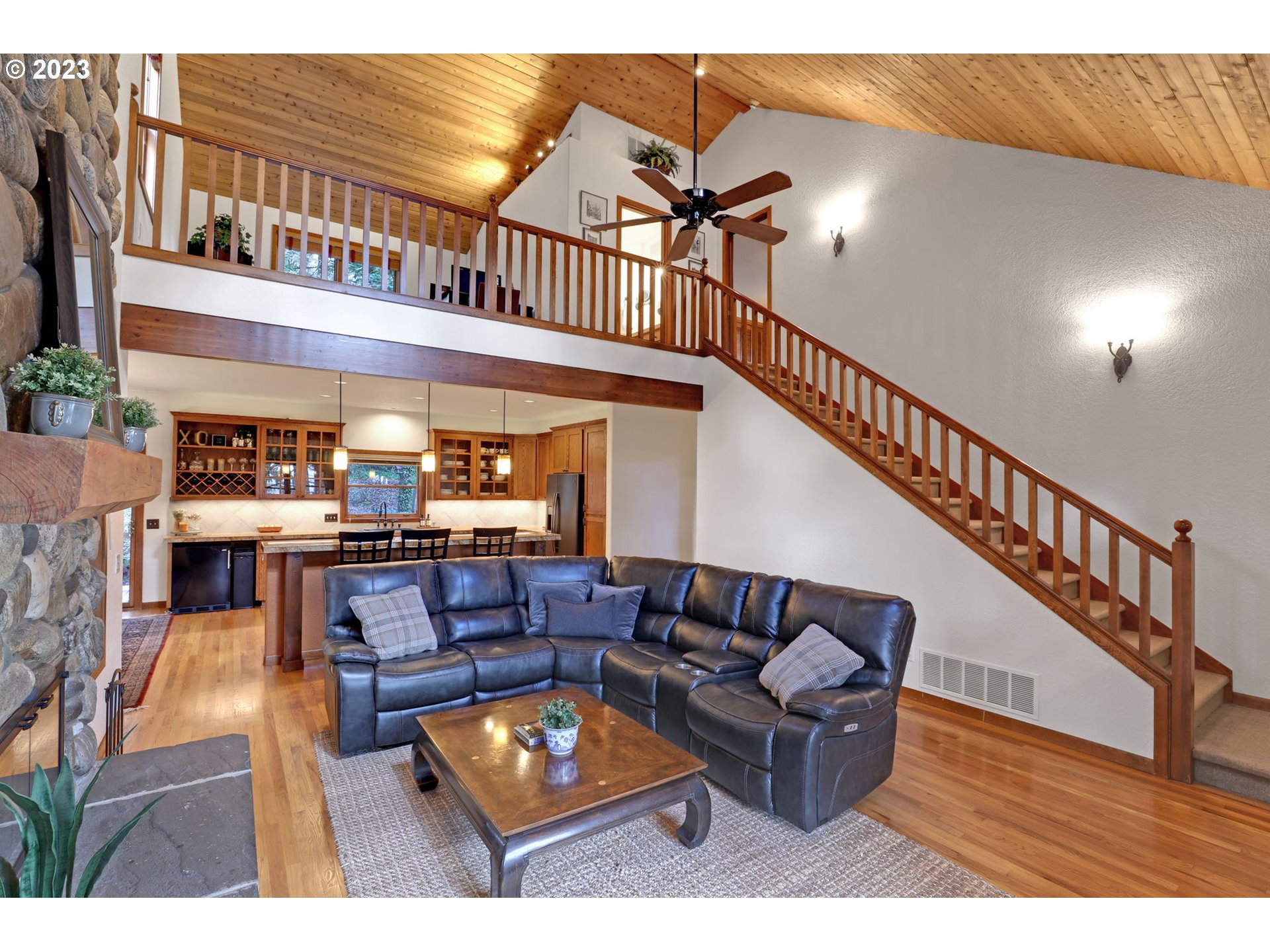 12434 Southwest 57th Avenue Portland, OR 97219 - Photo 9 of 34 a living room with furniture and a ceiling fan