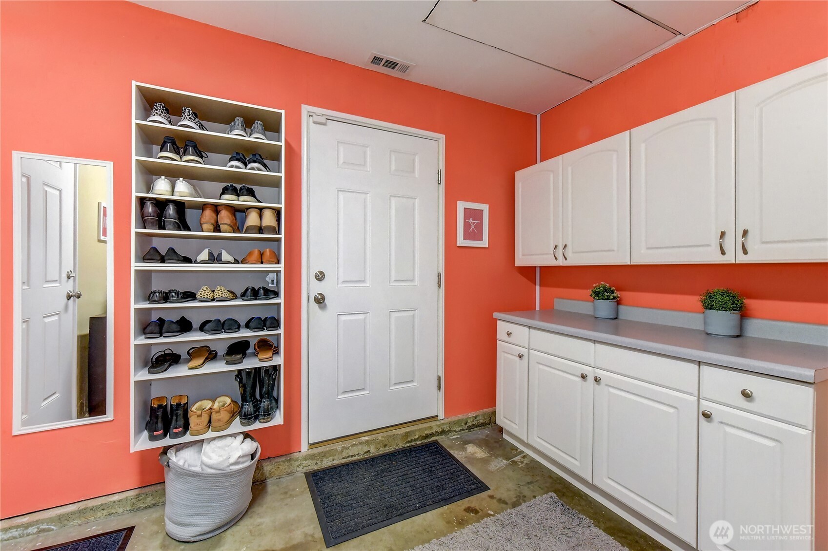 525 218th Street Southwest Bothell, WA 98021 - Photo 22 of 30 a room with an empty room and shelf