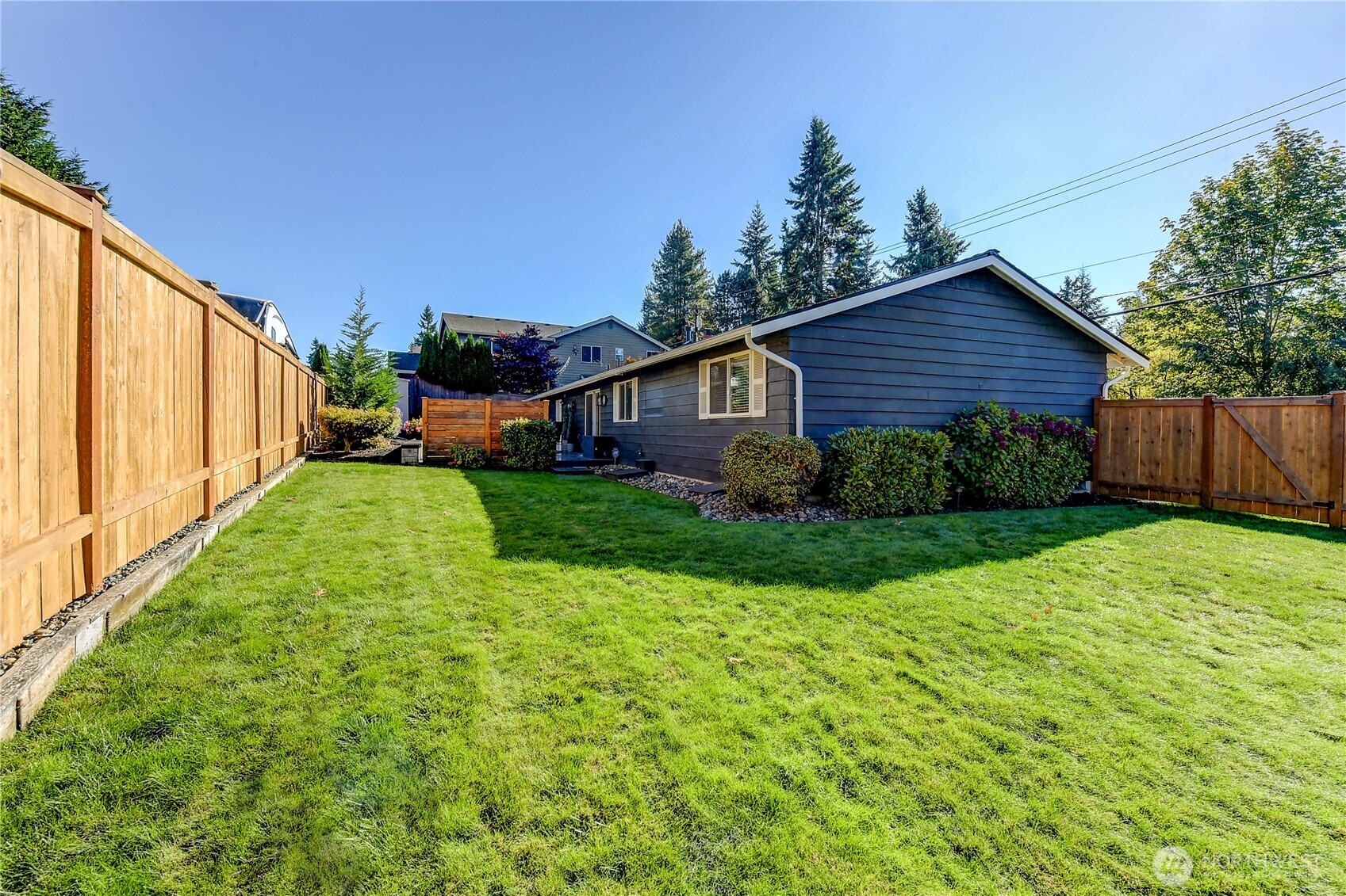 525 218th Street Southwest Bothell, WA 98021 - Photo 26 of 30 a view of a house with backyard and garden