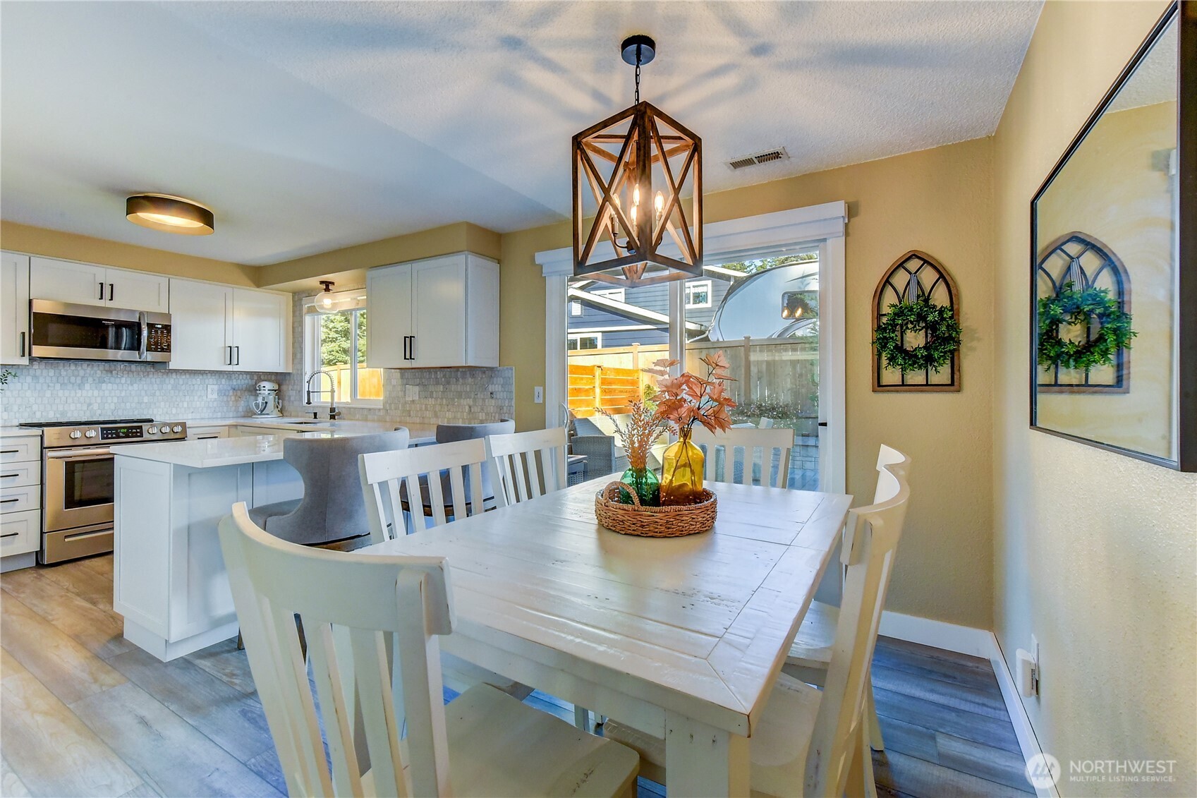 525 218th Street Southwest Bothell, WA 98021 - Photo 8 of 30 a view of a dining room with furniture and wooden floor