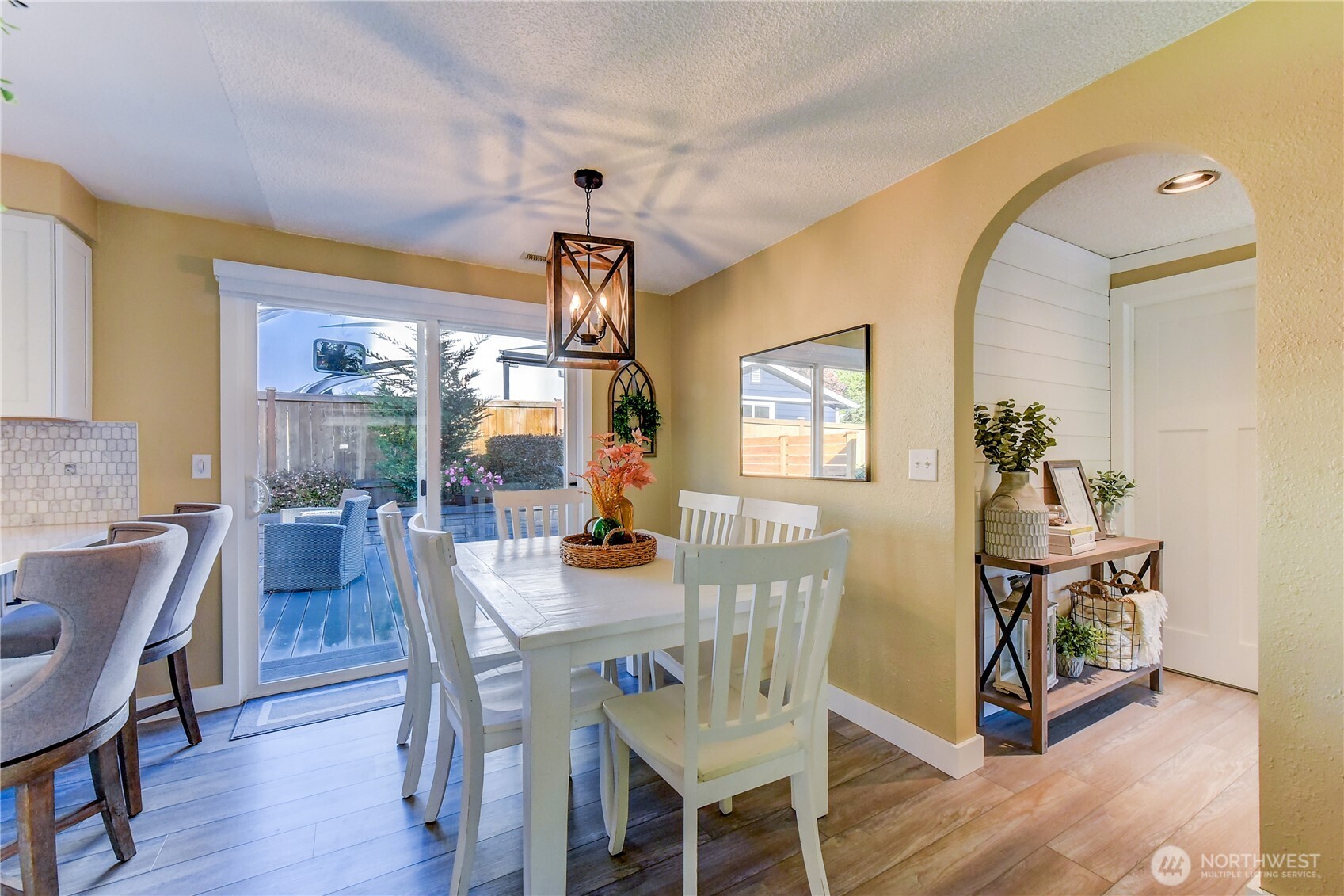 525 218th Street Southwest Bothell, WA 98021 - Photo 9 of 30 a view of a dining room with furniture window and wooden floor
