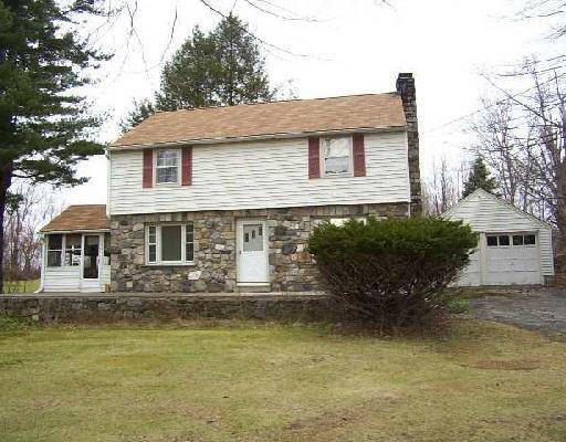 74 Gillotti Road New Fairfield, CT 06812 - Photo 1 of 1 a front view of a house with a yard