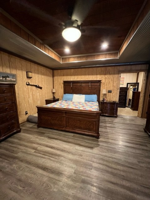 142 Lockmiller Road Winchester, TN 37398 - Photo 40 of 44 a bedroom with furniture and a chandelier