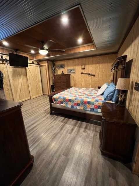 142 Lockmiller Road Winchester, TN 37398 - Photo 42 of 44 a bedroom with bed and wooden floor