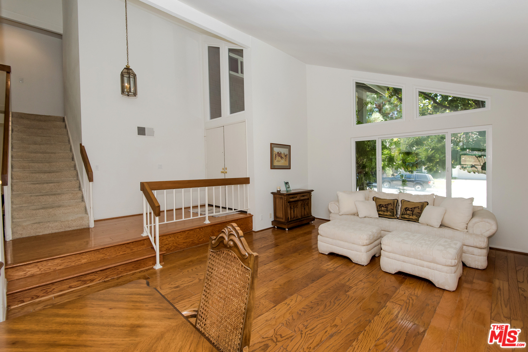 5533 Jon Dodson Drive Agoura Hills, CA 91301 - Photo 19 of 23 a living room with furniture and a large window