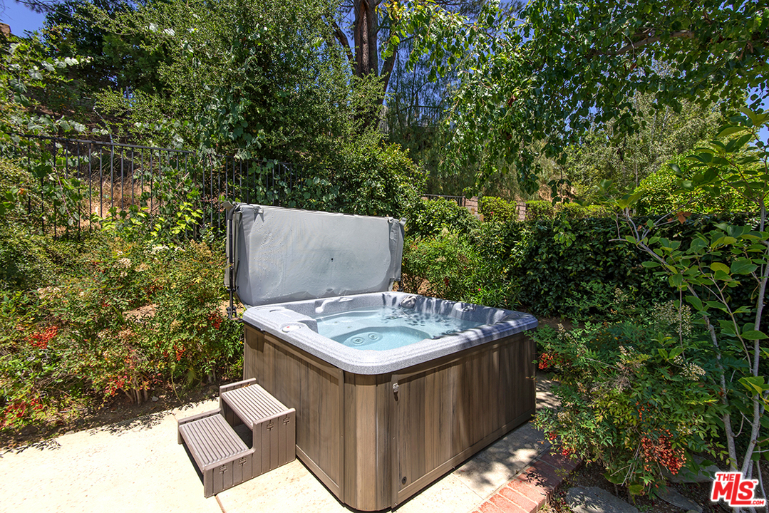 5533 Jon Dodson Drive Agoura Hills, CA 91301 - Photo 23 of 23 a view of a backyard with sitting area