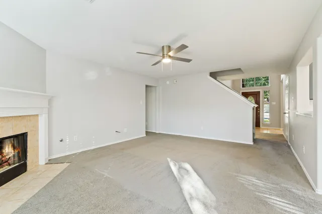 a kitchen with stainless steel appliances a sink stove and cabinets