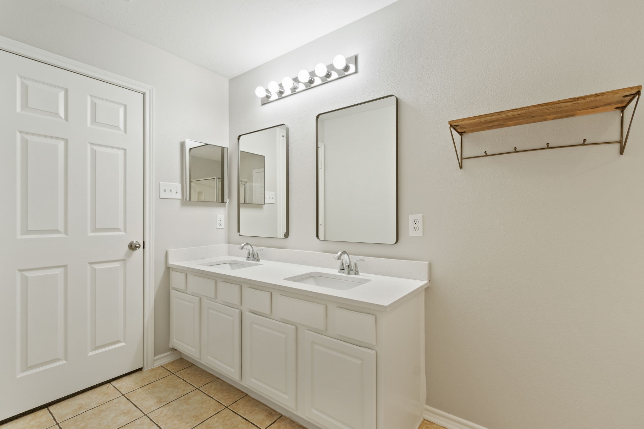 21035 Summer Trace Lane Spring, TX 77379 - Photo 23 of 50 a bathroom with a double vanity sink and a mirror
