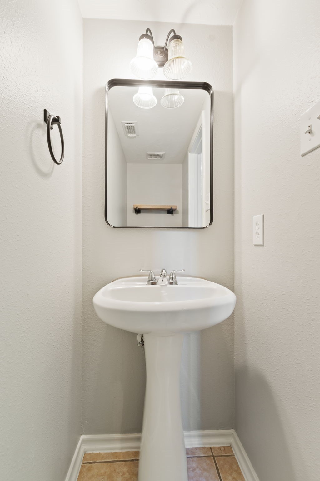 21035 Summer Trace Lane Spring, TX 77379 - Photo 25 of 50 a bathroom with a sink and mirror