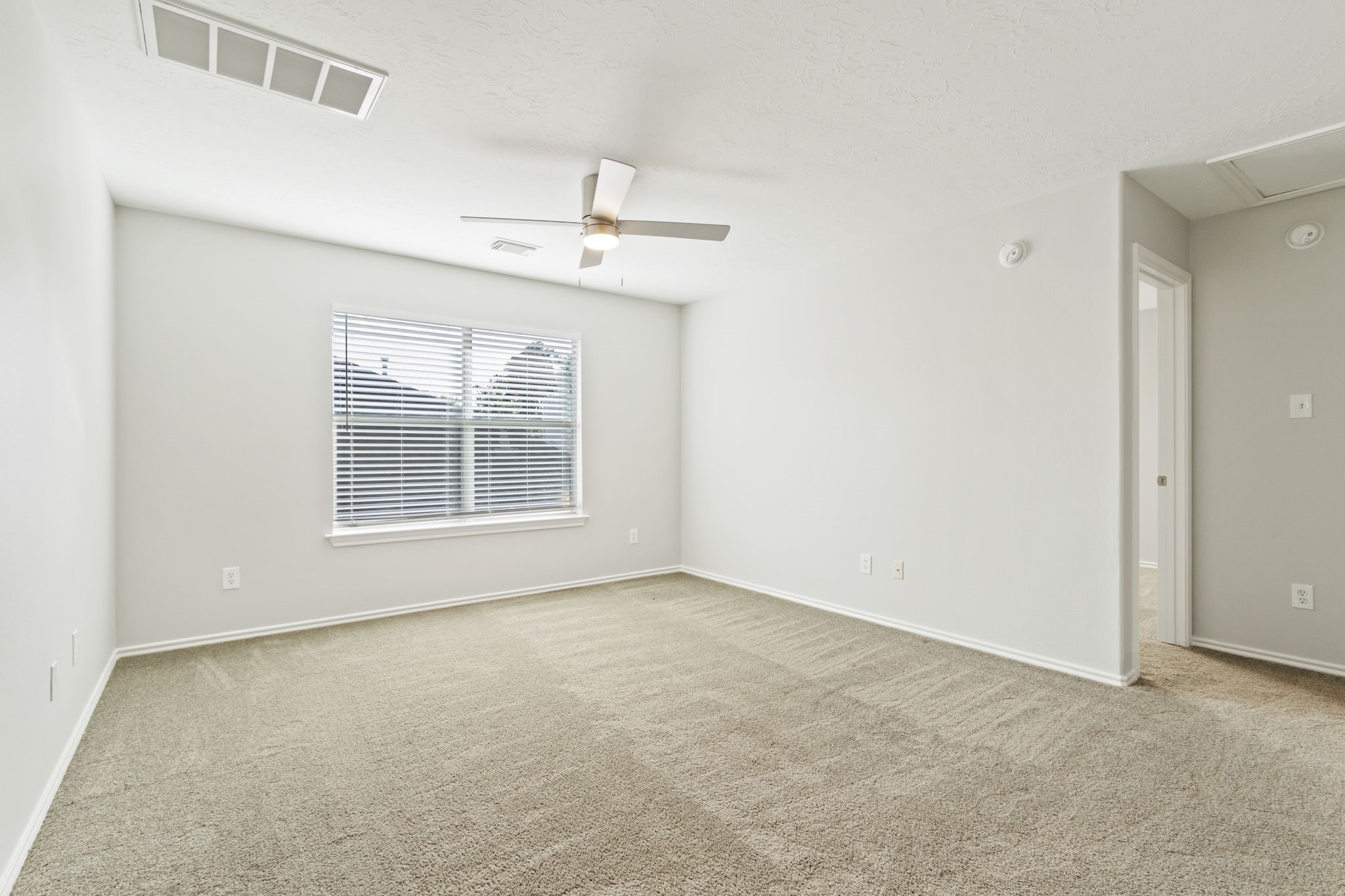 21035 Summer Trace Lane Spring, TX 77379 - Photo 29 of 50 a view of an empty room with a window