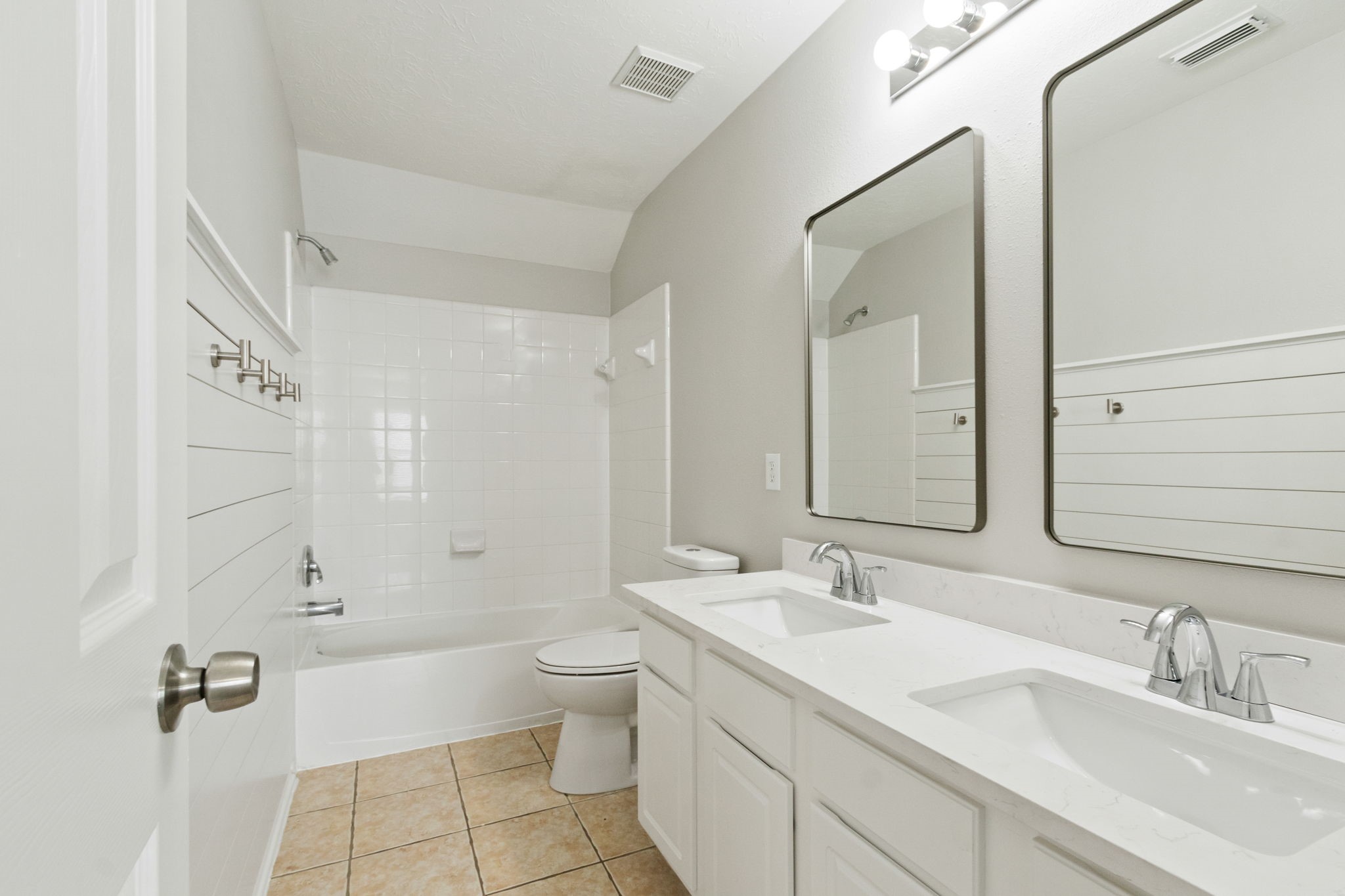 21035 Summer Trace Lane Spring, TX 77379 - Photo 31 of 50 a bathroom with a double vanity sink toilet and shower