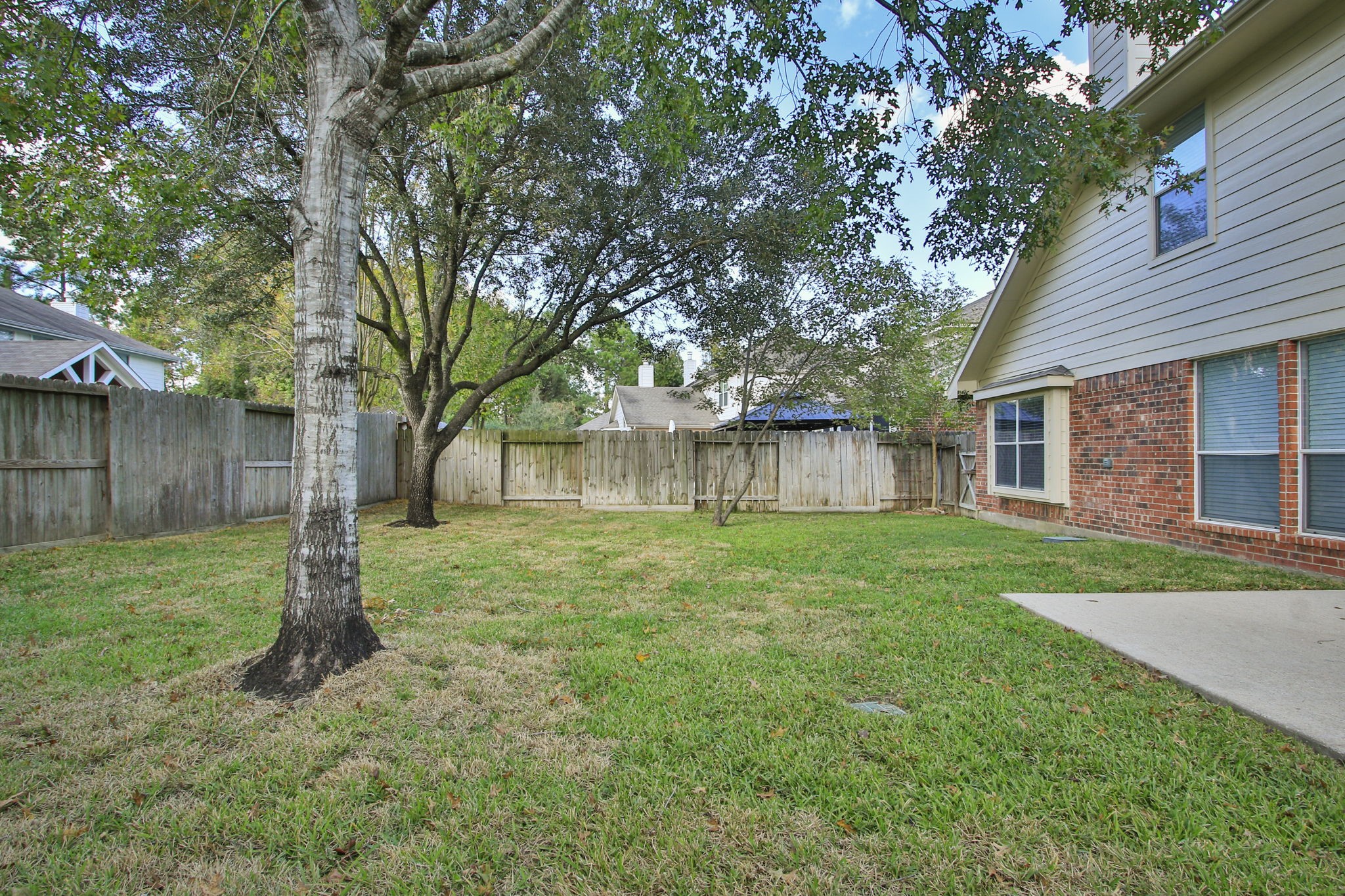 21035 Summer Trace Lane Spring, TX 77379 - Photo 36 of 50 a view of a house with yard and tree s