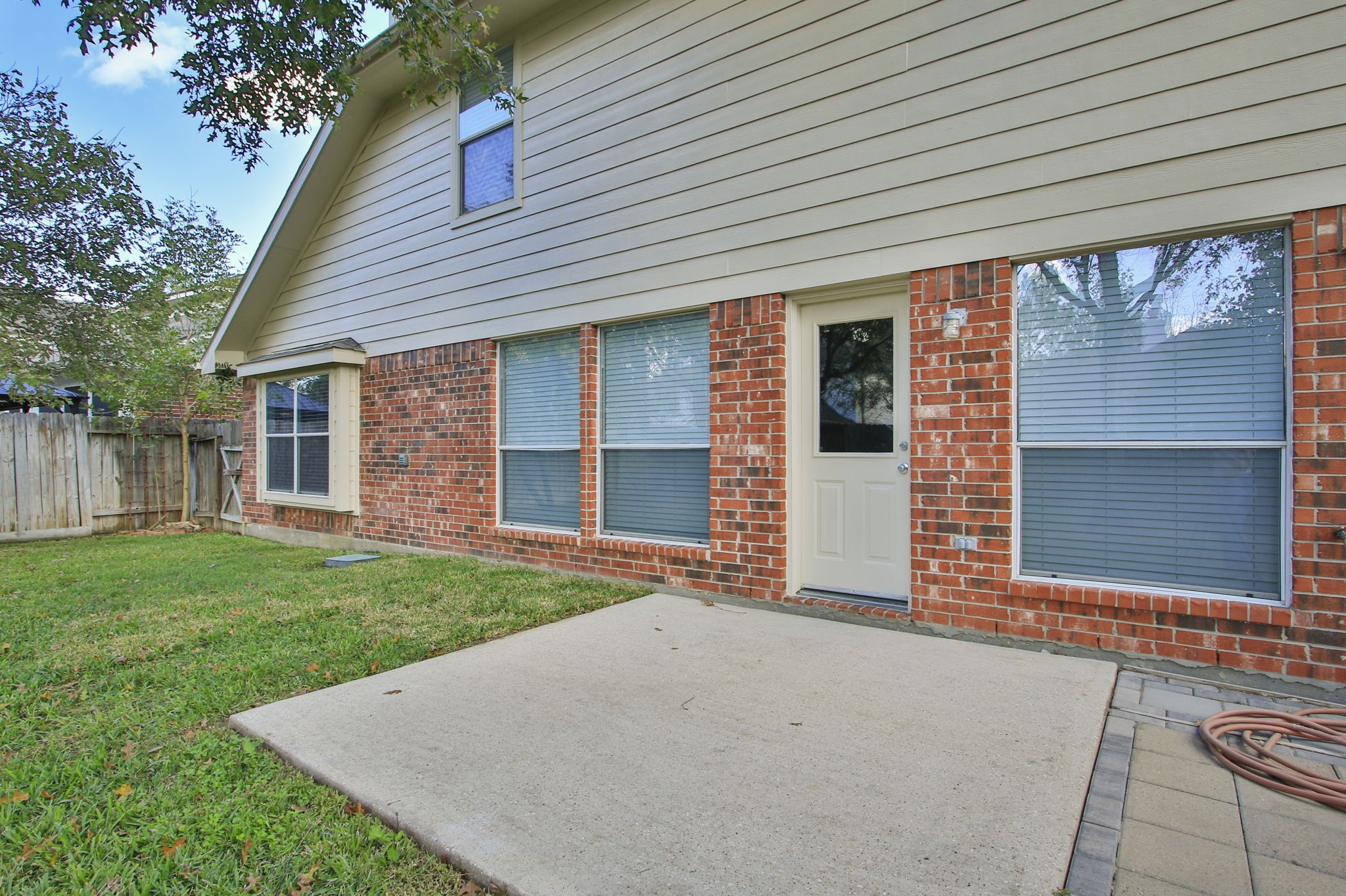 21035 Summer Trace Lane Spring, TX 77379 - Photo 37 of 50 a front view of a house with a garden