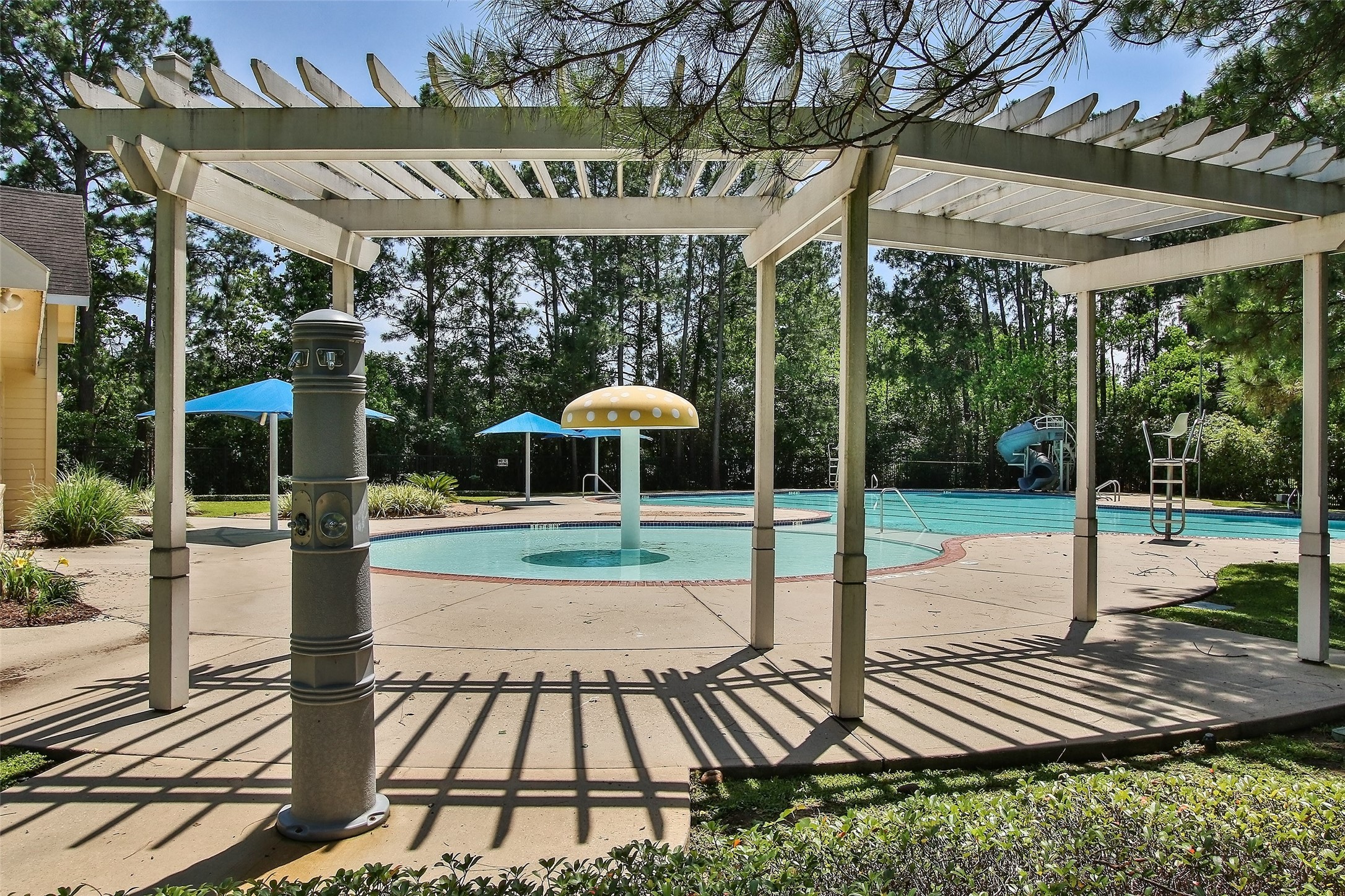 21035 Summer Trace Lane Spring, TX 77379 - Photo 46 of 50 a view of a patio with a table chairs and a backyard