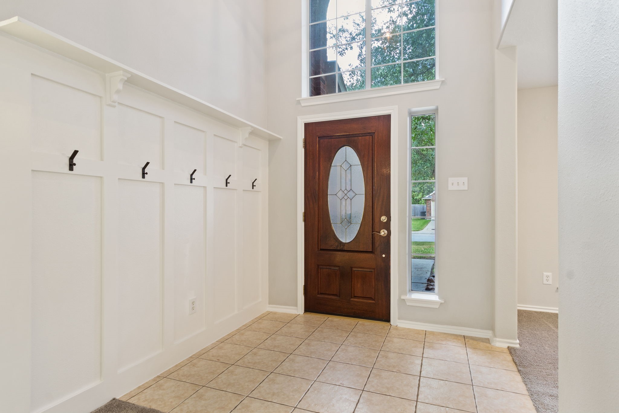 21035 Summer Trace Lane Spring, TX 77379 - Photo 8 of 50 a view of a entryway door with wooden floor