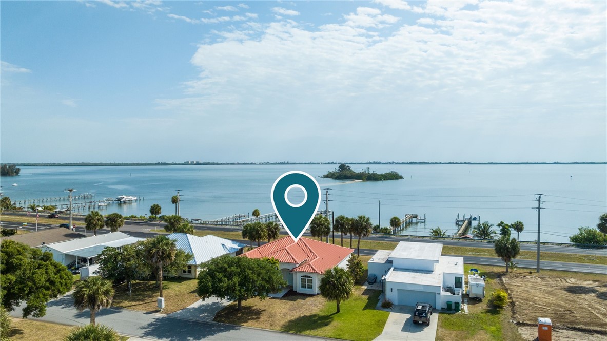 an aerial view of a houses with outdoor space