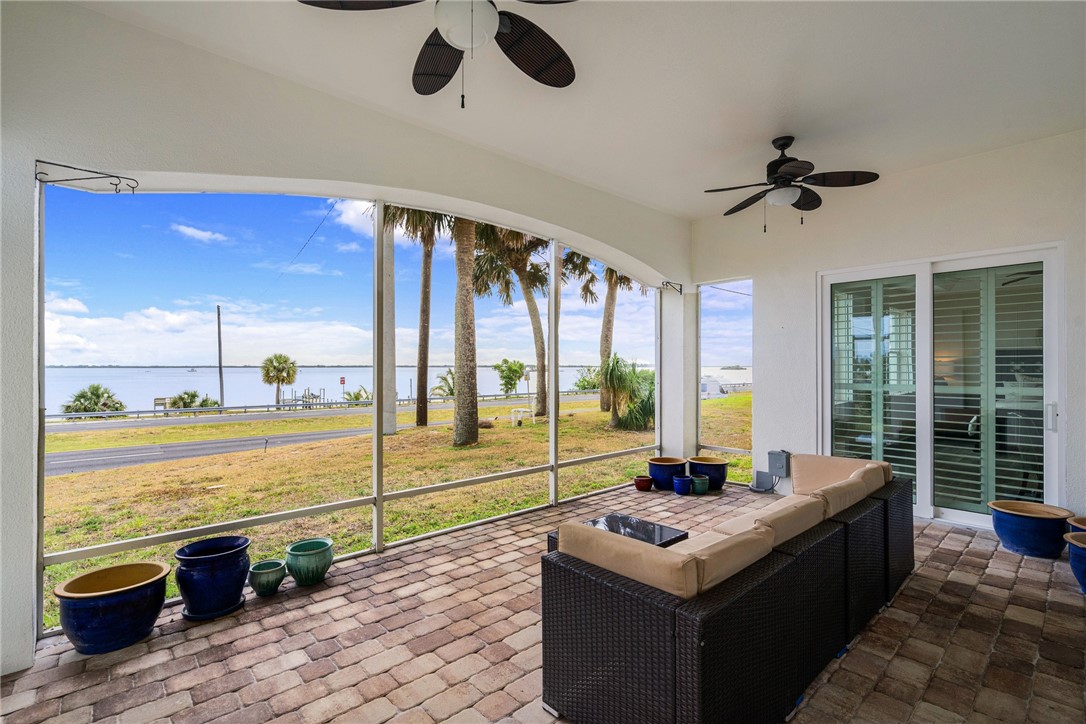 7635 Agawam Road Micco, FL 32976 - Photo 30 of 36 a living room with large window