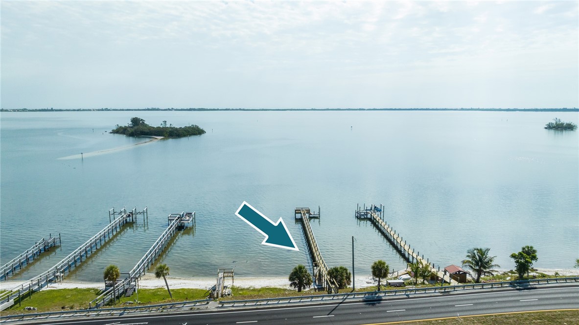 7635 Agawam Road Micco, FL 32976 - Photo 36 of 36 a view of a ceiling fan