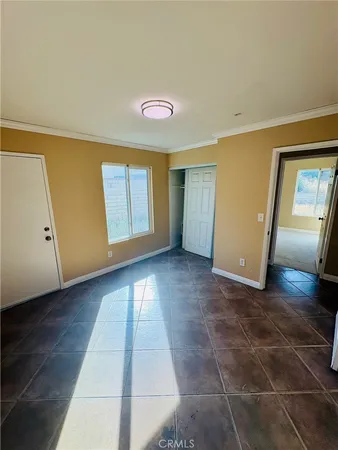 a view of livingroom with hardwood floor and hallway