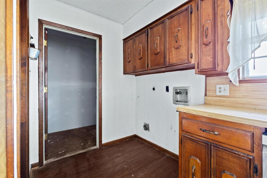 5994 Fm 1753 Denison, TX 75021 - Photo 15 of 34 a view of cabinets and wooden floor