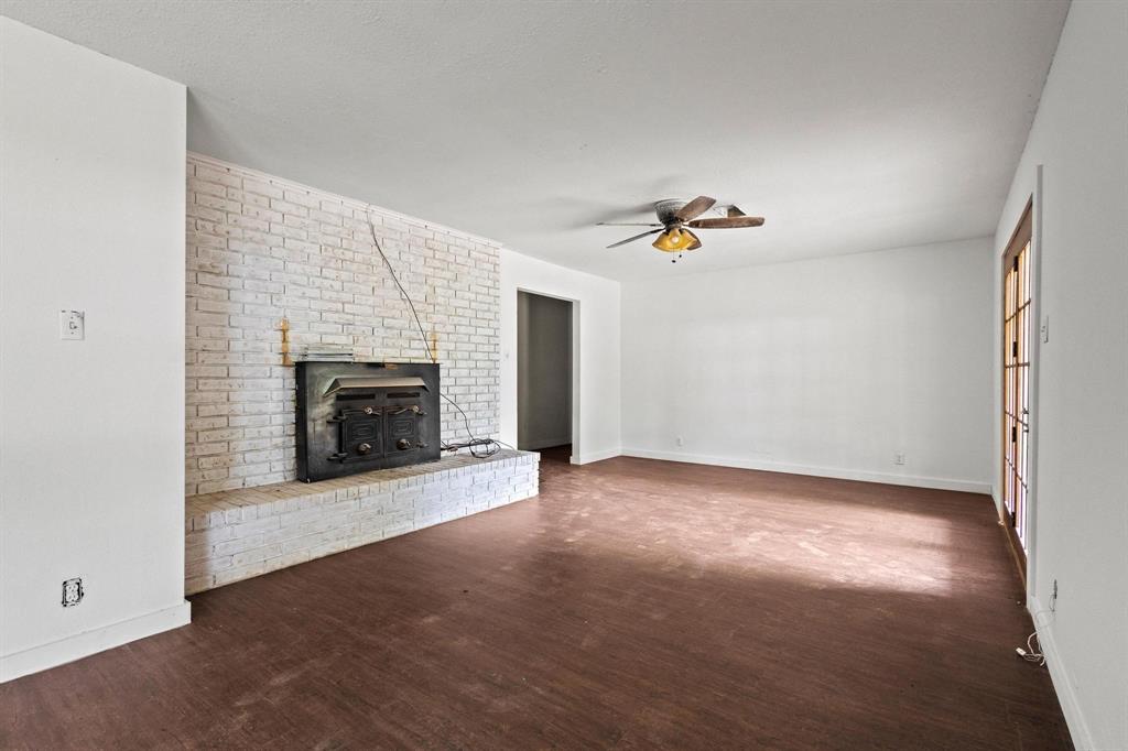 5994 Fm 1753 Denison, TX 75021 - Photo 17 of 34 an empty room with windows and fireplace