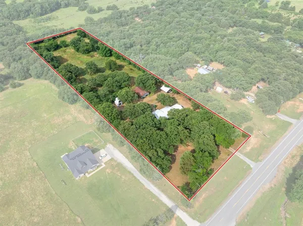 a view of a garden from a balcony