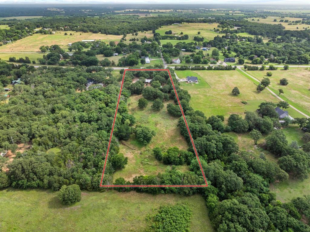 5994 Fm 1753 Denison, TX 75021 - Photo 7 of 34 an aerial view of residential houses with outdoor space