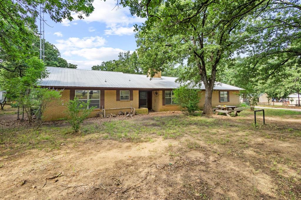 5994 Fm 1753 Denison, TX 75021 - Photo 10 of 34 a view of a house with a yard