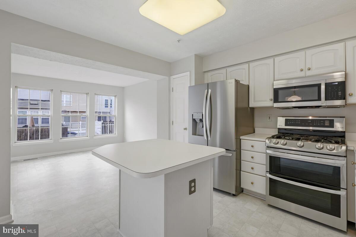 5032 Finsbury Road Rosedale, MD 21237 - Photo 12 of 40 Kitchen Island