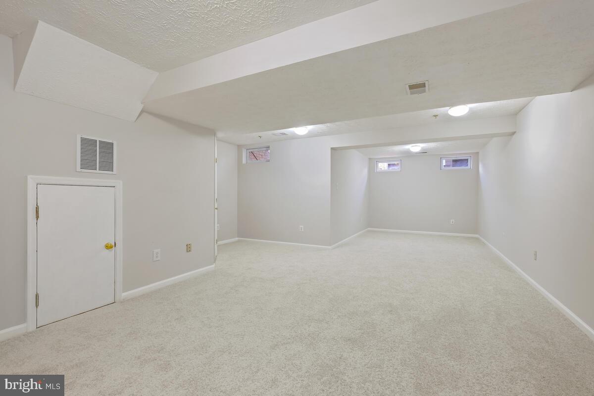 5032 Finsbury Road Rosedale, MD 21237 - Photo 30 of 40 Finished Basement