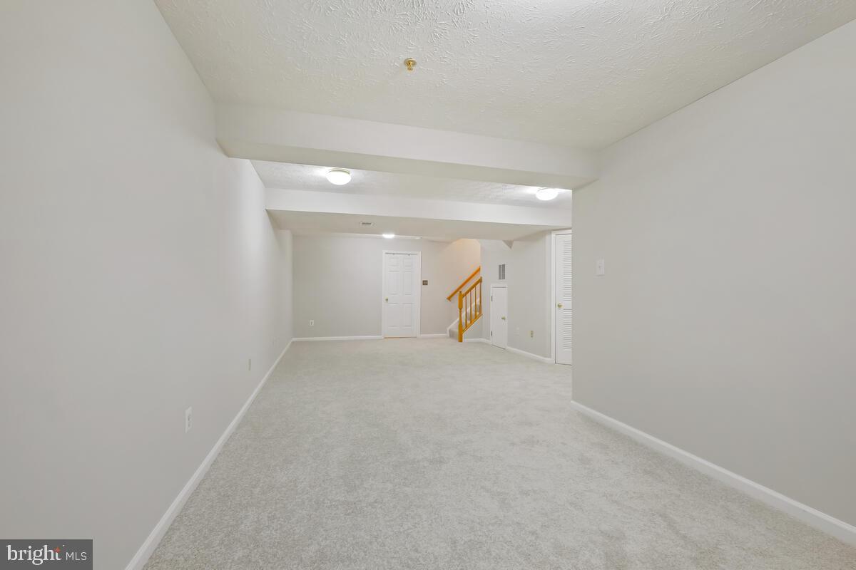 5032 Finsbury Road Rosedale, MD 21237 - Photo 31 of 40 Finished Basement