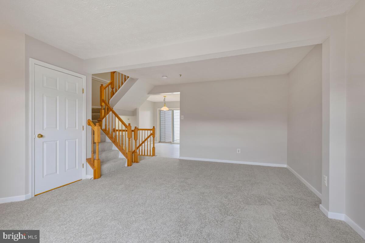 5032 Finsbury Road Rosedale, MD 21237 - Photo 6 of 40 Living Room w/ Fresh Paint and New Carpet