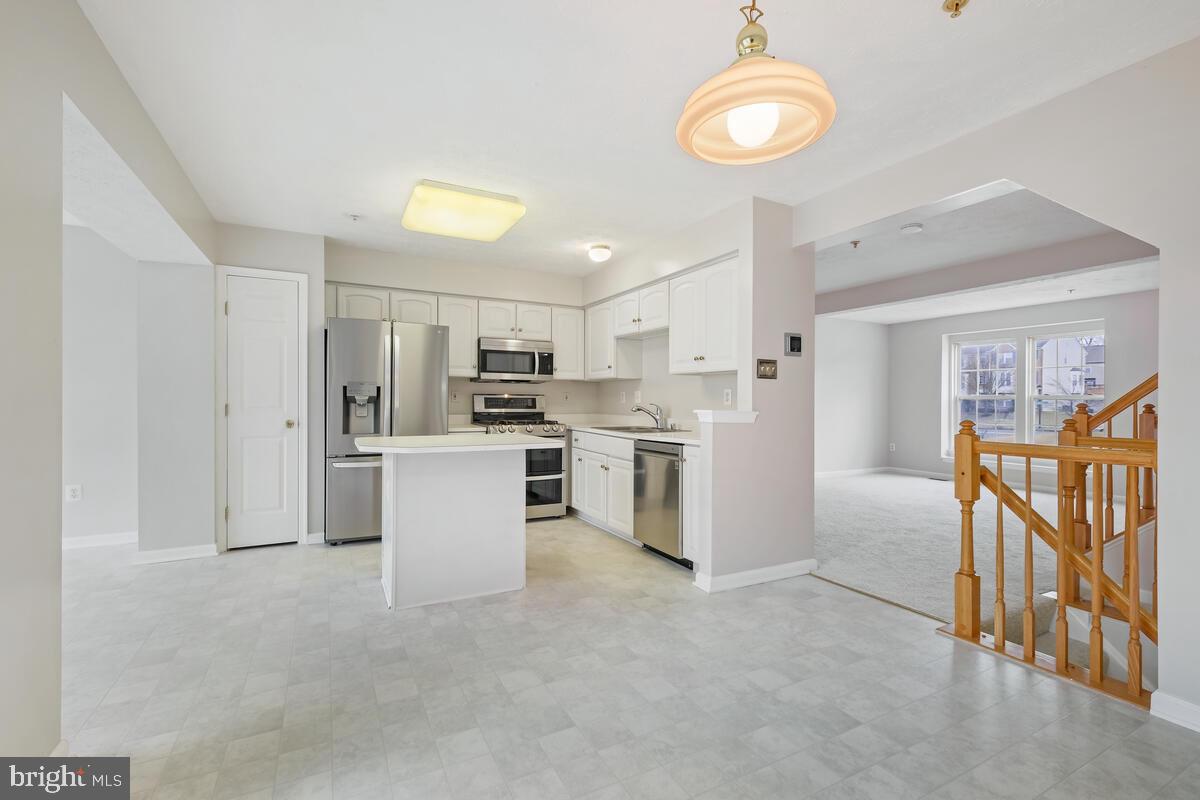 5032 Finsbury Road Rosedale, MD 21237 - Photo 10 of 40 Large Open-Concept Kitchen w/ Island