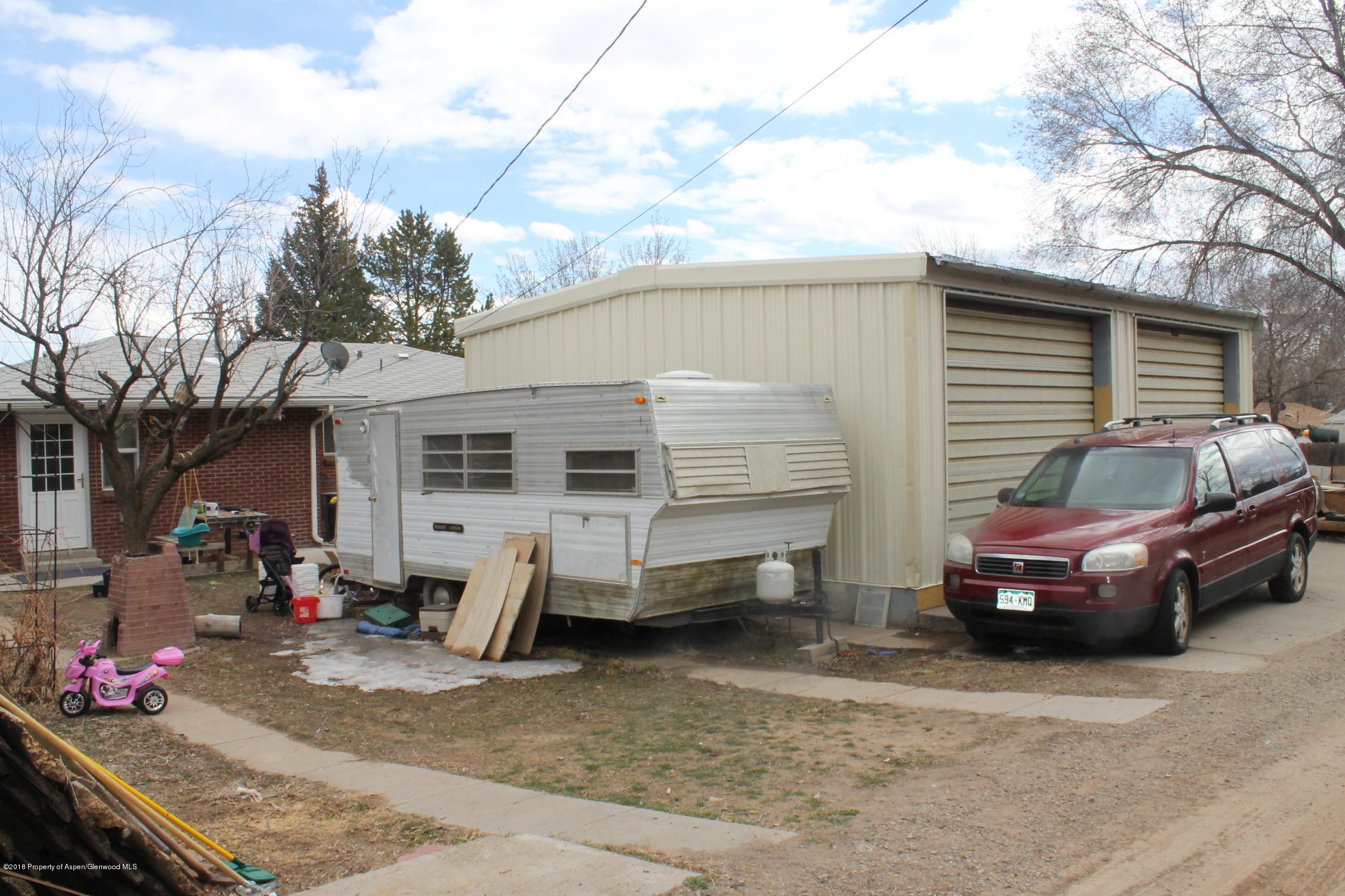 405 Ute Avenue Rifle, CO 81650 - Photo 21 of 21 a car parked in front of a house
