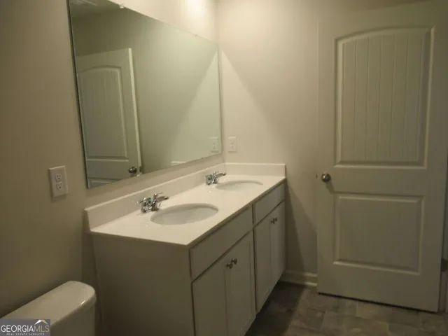 a view of two couches in a room