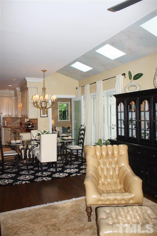 8108 Windsor Ridge Drive Raleigh, NC 27615 - Photo 17 of 25 a large white kitchen with a large window