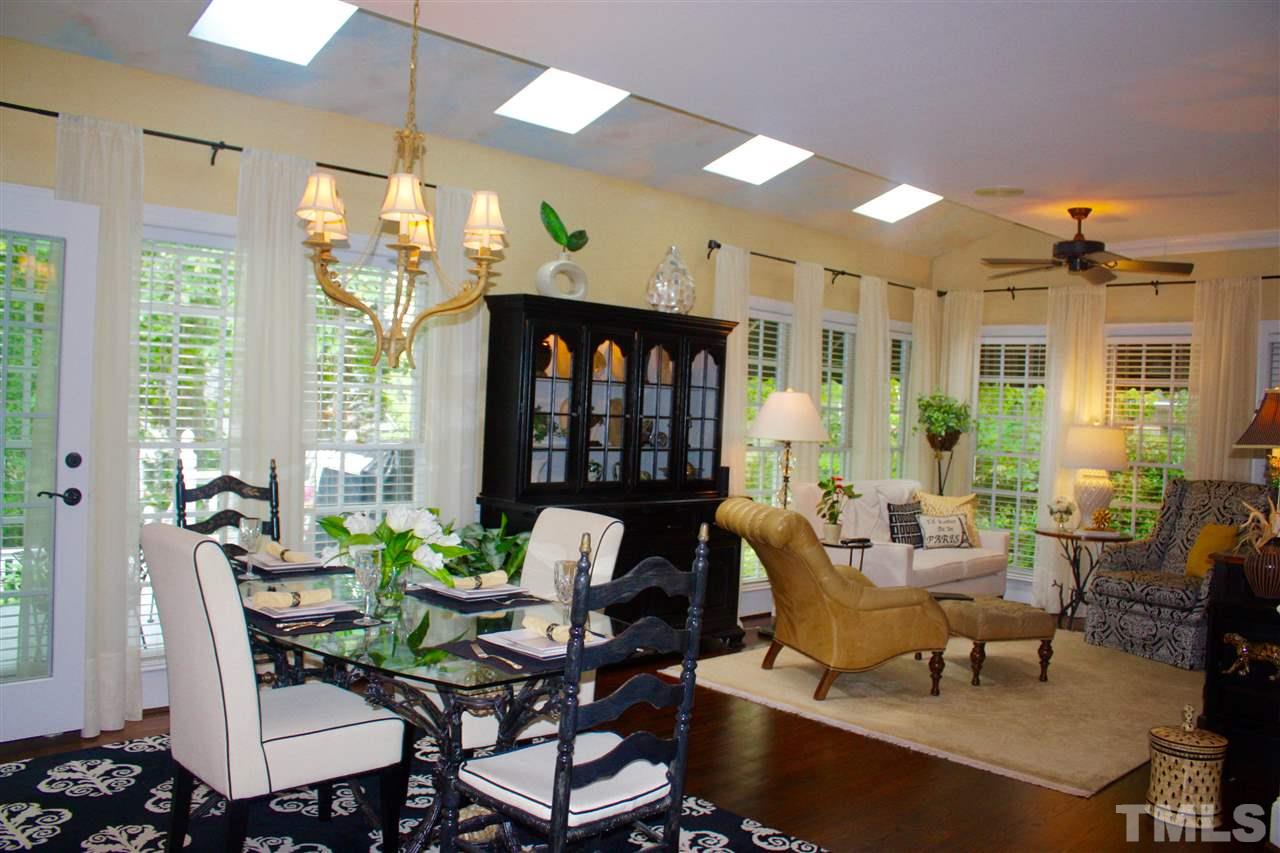 8108 Windsor Ridge Drive Raleigh, NC 27615 - Photo 19 of 25 a view of a dining room with furniture window and outside view