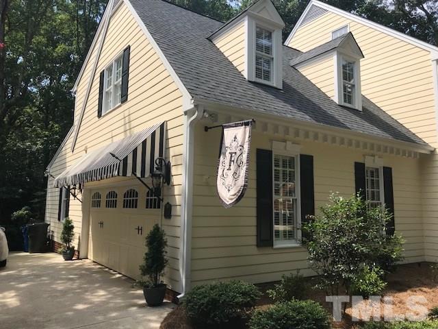 8108 Windsor Ridge Drive Raleigh, NC 27615 - Photo 3 of 25 a view of a house with brick walls