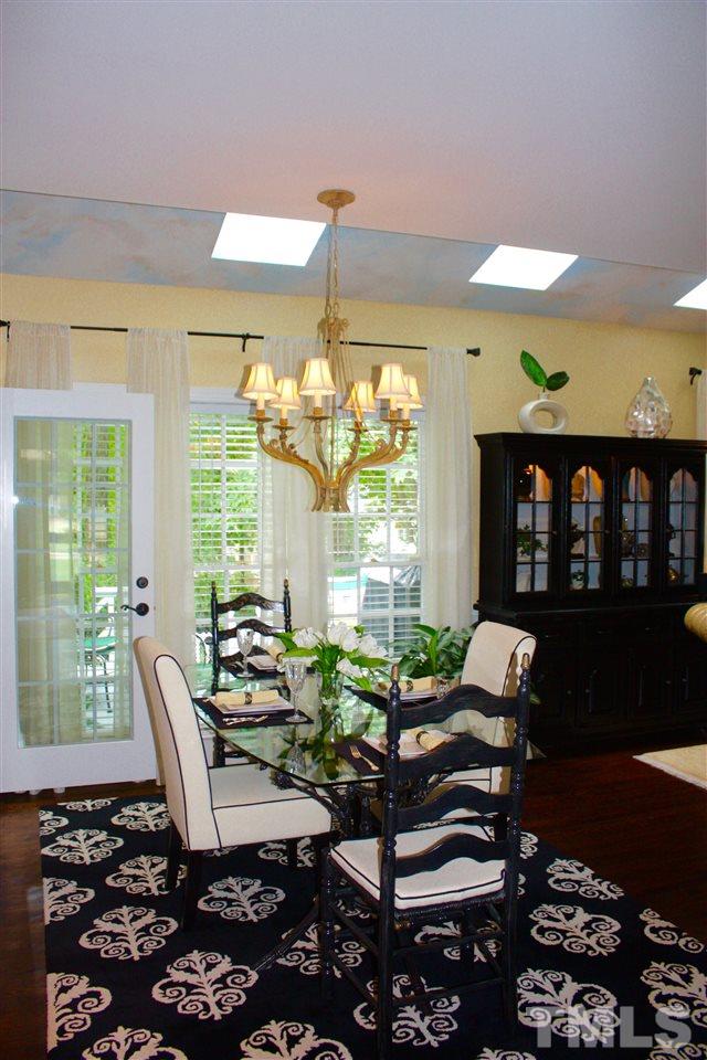 8108 Windsor Ridge Drive Raleigh, NC 27615 - Photo 20 of 25 a outdoor living space with furniture and a potted plant