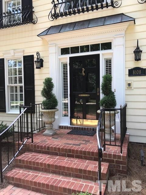 8108 Windsor Ridge Drive Raleigh, NC 27615 - Photo 6 of 25 a view of a building with a balcony