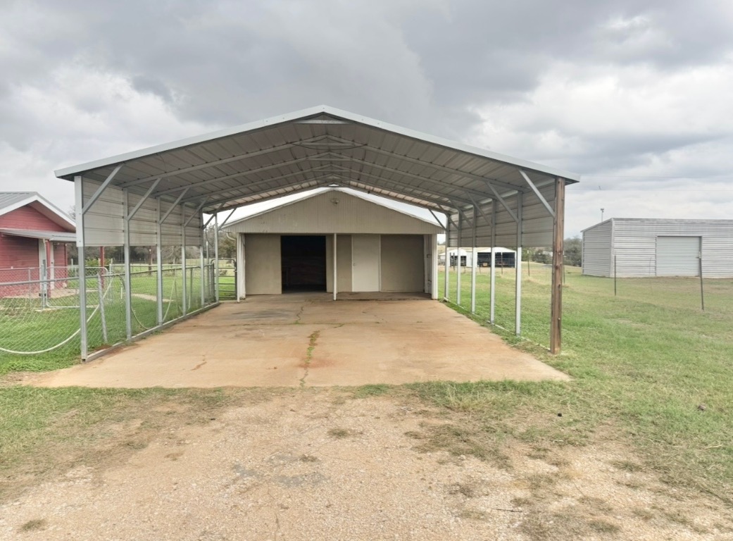 110 Marek Road Elgin, TX 78621 - Photo 26 of 27 a front view of a house with a yard