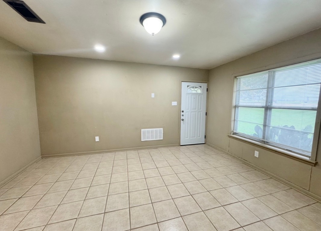 110 Marek Road Elgin, TX 78621 - Photo 6 of 27 an empty room with windows