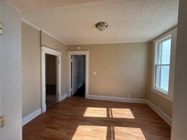 a view of an empty room and window