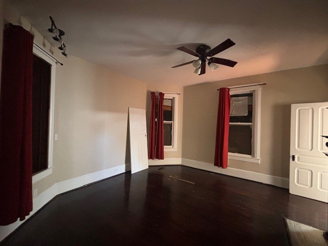 118 North 3rd Street, Unit 1 Pulaski, TN 38478 - Photo 7 of 15 a view of a livingroom with a ceiling fan window and wooden floor
