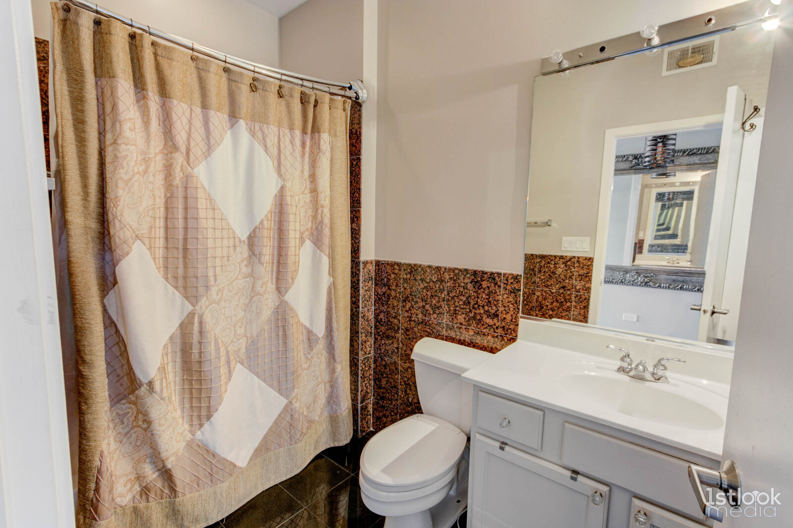 1033 West 14th Place, Unit 413 Chicago, IL 60608 - Photo 13 of 42 a bathroom with a sink toilet and shower