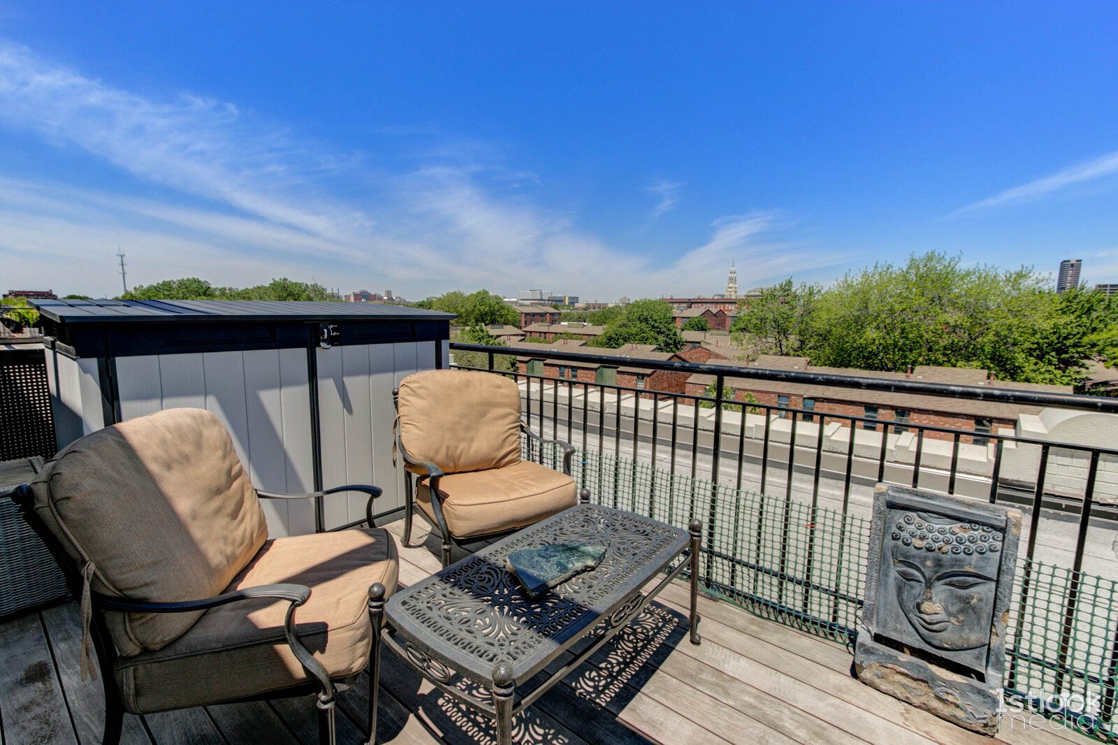 1033 West 14th Place, Unit 413 Chicago, IL 60608 - Photo 21 of 42 a view of a balcony with wooden chairs