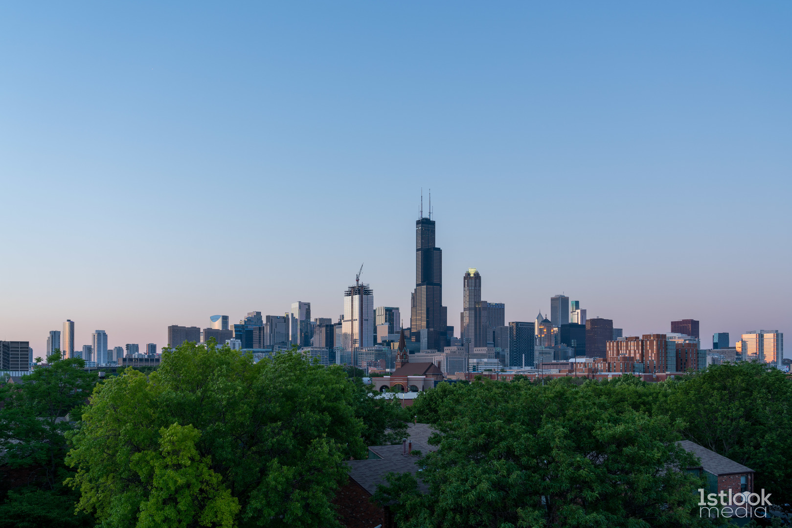 1033 West 14th Place, Unit 413 Chicago, IL 60608 - Photo 24 of 42 a view of a city with tall buildings in the background